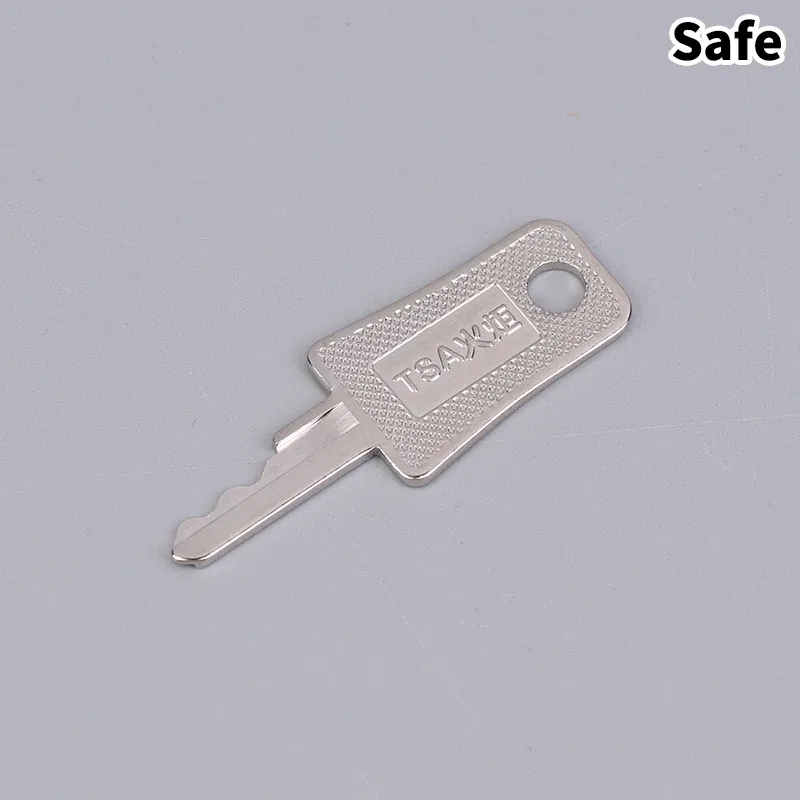 cadenas serrure tsa métal ornementation clé universelle poignet vert pastel étiquette blanche voyage valise identification accès sécurité