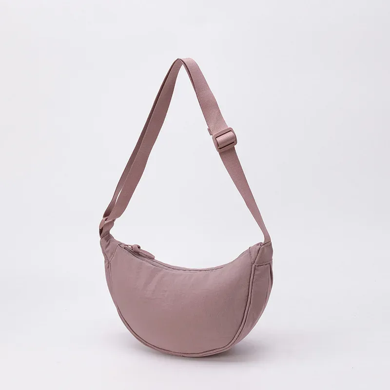 sac bandoulière polyvalent en nylon léger, durable et élégant, disponible en plus de 20 couleurs vibrantes pour un usage quotidien, les voyages et les sorties.