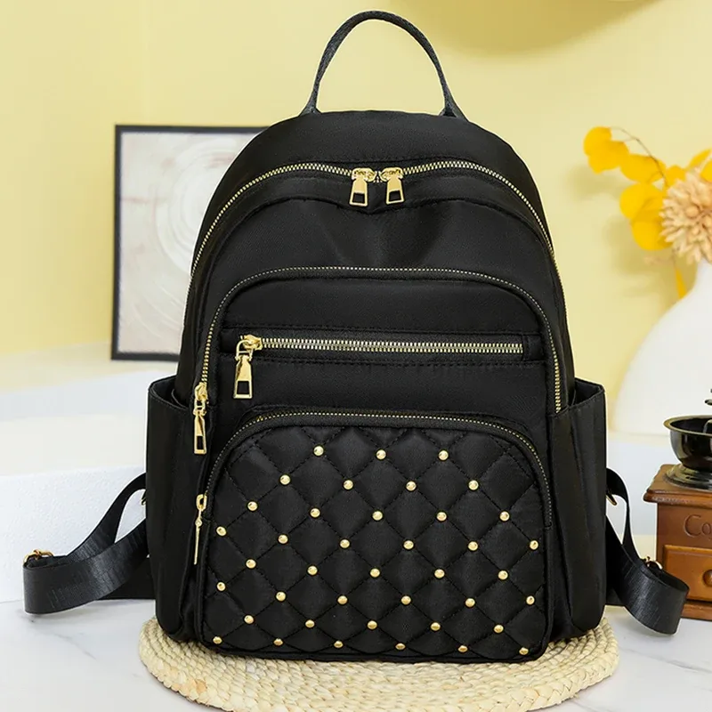 sac à dos brodé à carreaux de diamant, avec rivets, sac de voyage tendance pour femmes, sac à dos décontracté et polyvalent pour femmes