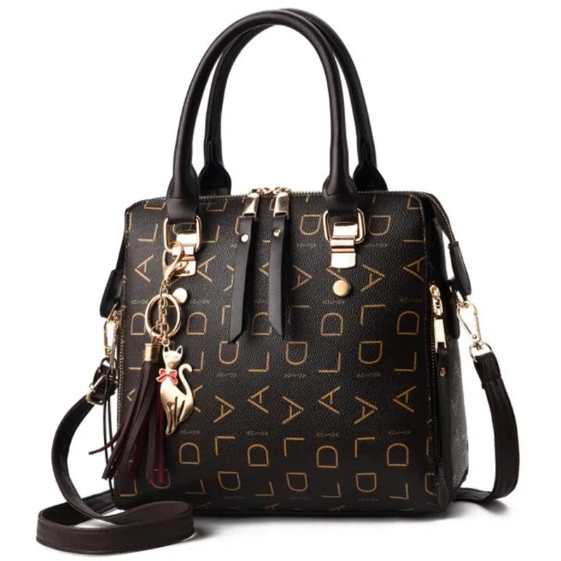 sac à main en cuir pu avec lettres anglaises pour femmes, sac à poignée supérieure avec pompon, sac à bandoulière de luxe de grande capacité, fourre-tout design