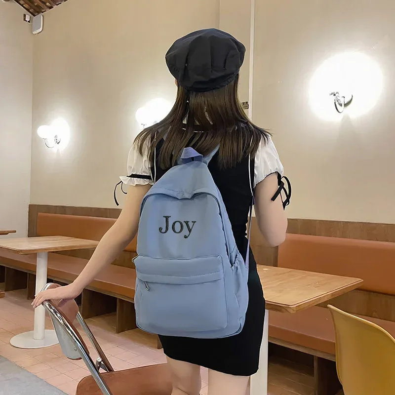nouveaux sacs d'école personnalisés nom personnalisé broderie grande capacité en nylon étudiant sac à dos adultes enfants sacs de voyage