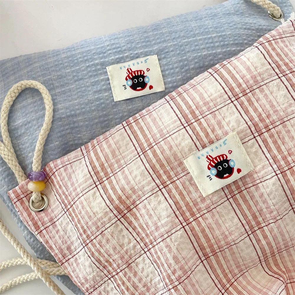 sac à dos d'été pour femmes, sac à dos à deux épaules avec cordon de serrage, sac à dos kawaii pour adolescentes, sac à dos coréen en toile ultra légère à carreaux
