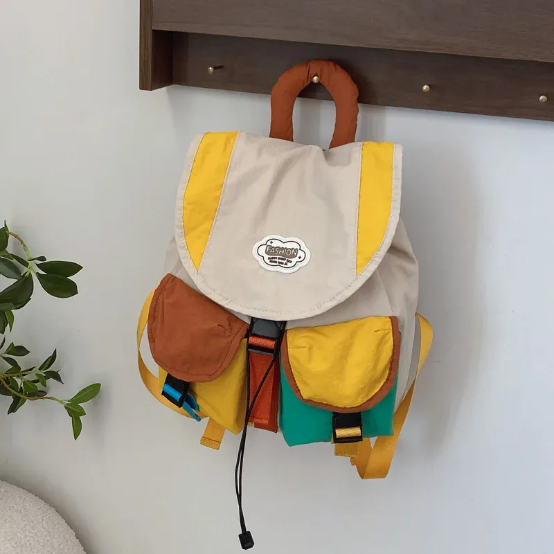 sac dos oxford cloth toile patchwork alphabet décontracté pompon bandoulière arquée anti-vol respirant usage idation voyager école pleinair