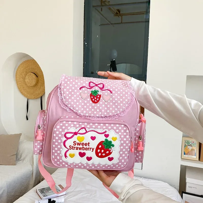 sac à dos rose pour enfants, motif fraise brodée, style dessin animé japonais, idéal pour l'école, cadeau d'anniversaire, nouveauté 2026