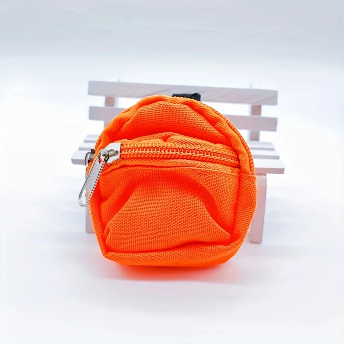 sac dos nylon petit format ovale fermeture glissière poche latérale double épaule poches latérales couleur vivante usage voyage