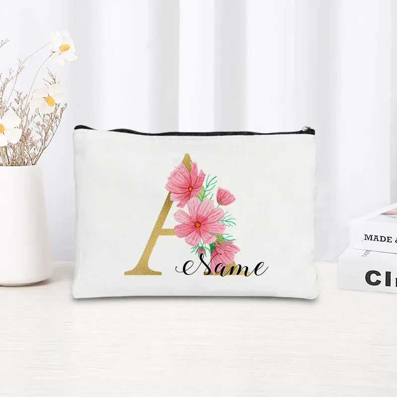 grande pochette zippée à motif floral rose et initiales dorées, organisateur d'essentiels de voyage en toile, trousse de maquillage pour enterrement de vie de jeune fille avec sac personnalisé avec nom.