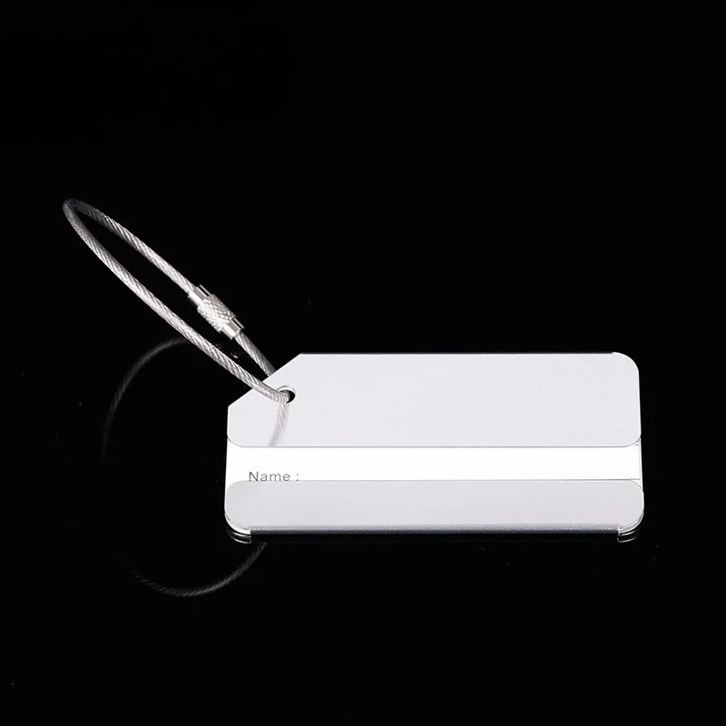 étiquette bagage métallique orange blanche bande horizontale géométrique identification voyage accessoires voyage porte adresses