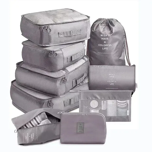 organisateur voyage polyester beige clair tissu imperméable poches maille transparente fermetures glissière poignées intégrées grande taille
