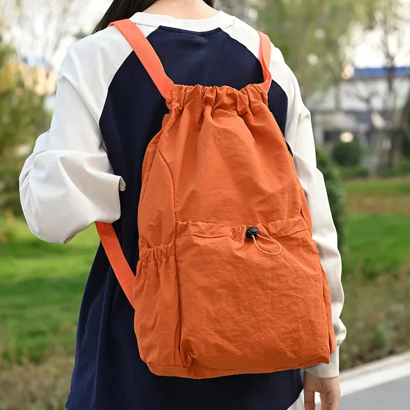 nouveau sac à dos pliable à cordon de serrage, imperméable, léger, grande capacité, sac de sport, sac de voyage portable pour la randonnée en plein air et les loisirs.