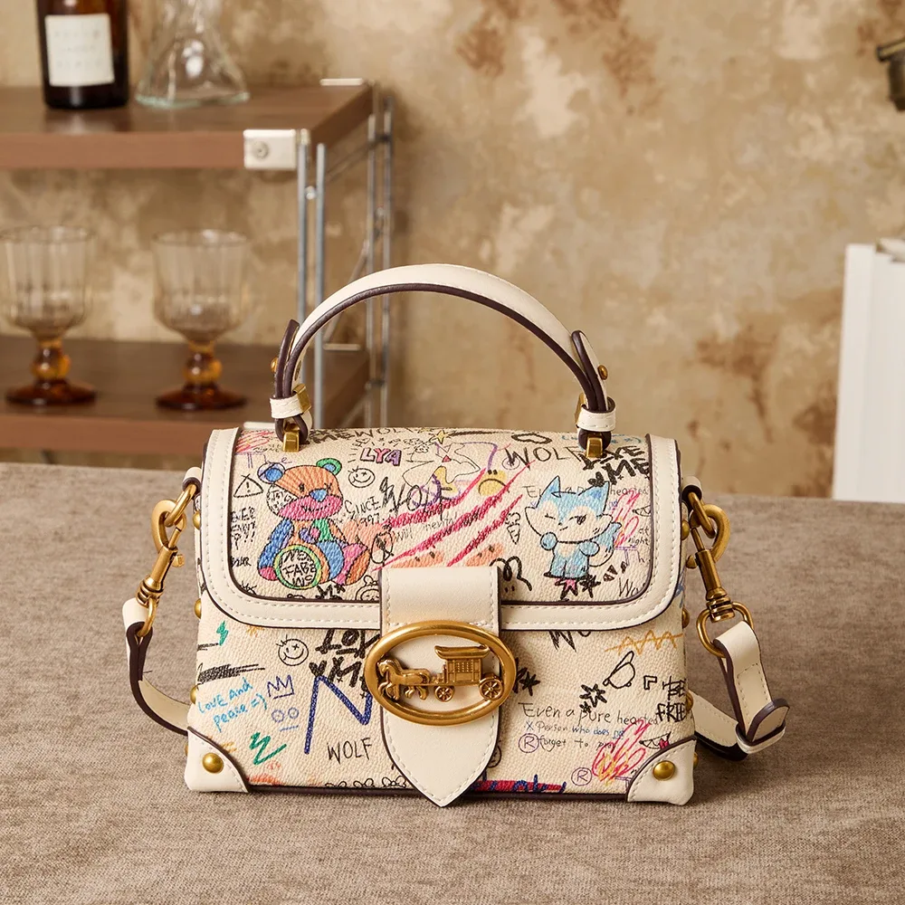 sac à main rétro graffiti avancé pour femmes, nouveau design de niche 2026, imprimé polyvalent, sac à bandoulière tendance.