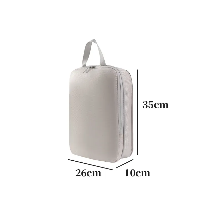 organisateur voyage polyester blanc bandes grises format rectangulaire poignées grises compression vêtements articles toilette rangement valise