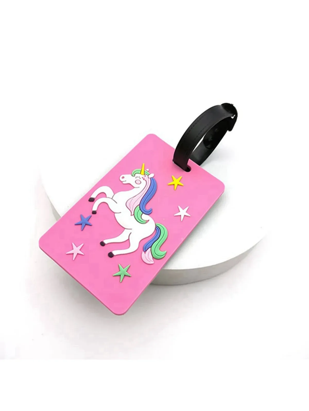 étiquette bagage silicium imprimé licorne jaune rose violet petite étoile bleue poignée noire voyage