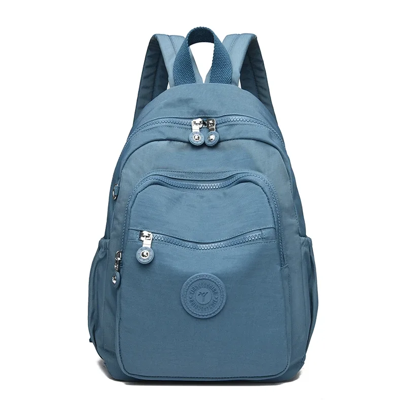sac dos nylon unisexe noir poche latérale fermeture éclair doublure beige imprimé usage journalier