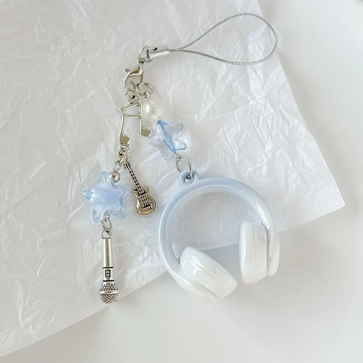 porte clé musical chaine métal accoutrements musicaux petit pendentif créatif voyage sac main pods casque bouton poussoir écouteurs accessoire voyage