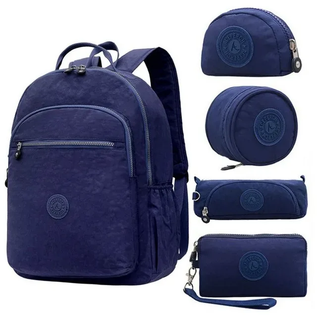 sac dos nylon gris anthracite compartiments poches latérales glissière accessoires pompon porte monnaie voyage école adolescente