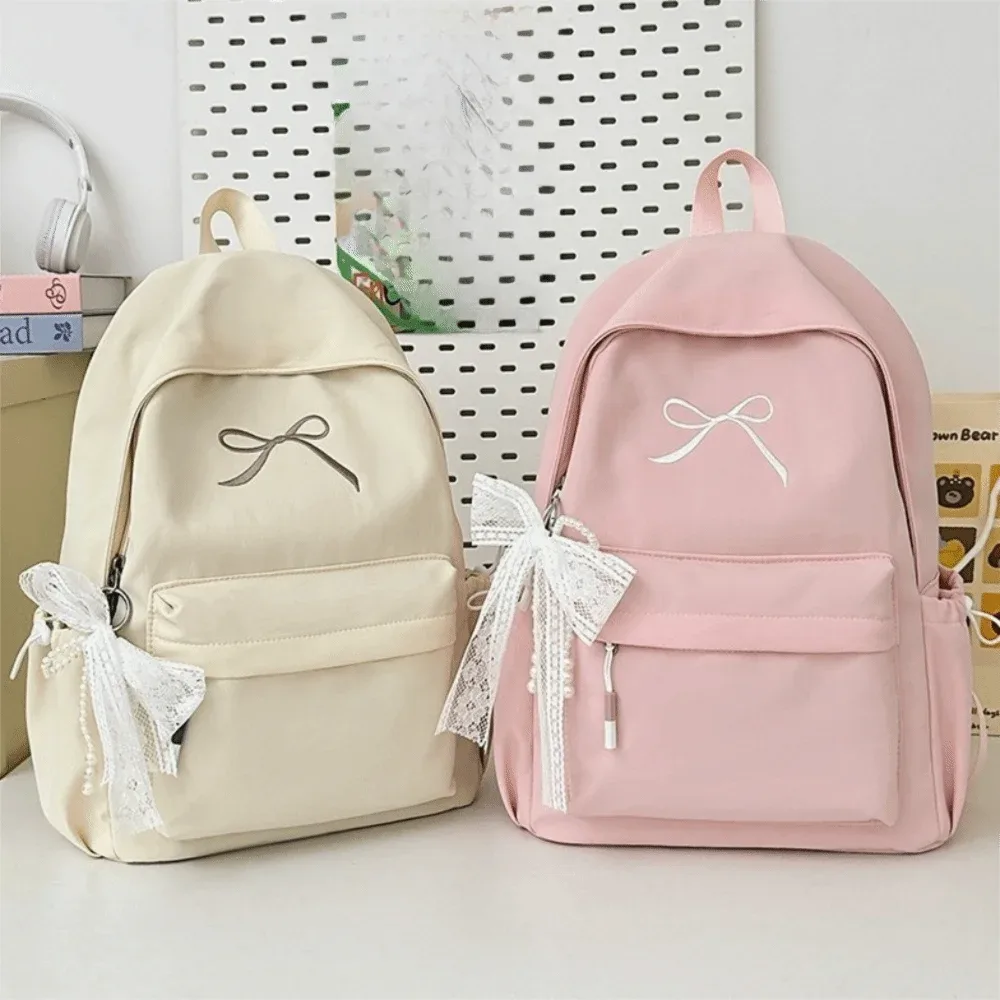 sac à dos portable avec nœud brodé pour filles, cartable en nylon de couleur unie pour étudiants, sac à dos de voyage léger de grande capacité