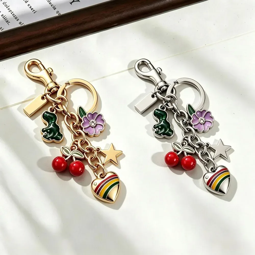 pince clé ornements charmes cerise fleur étoile cœur arc ciel métal doré marron rose décoration sac main porte clés accessoire voyage