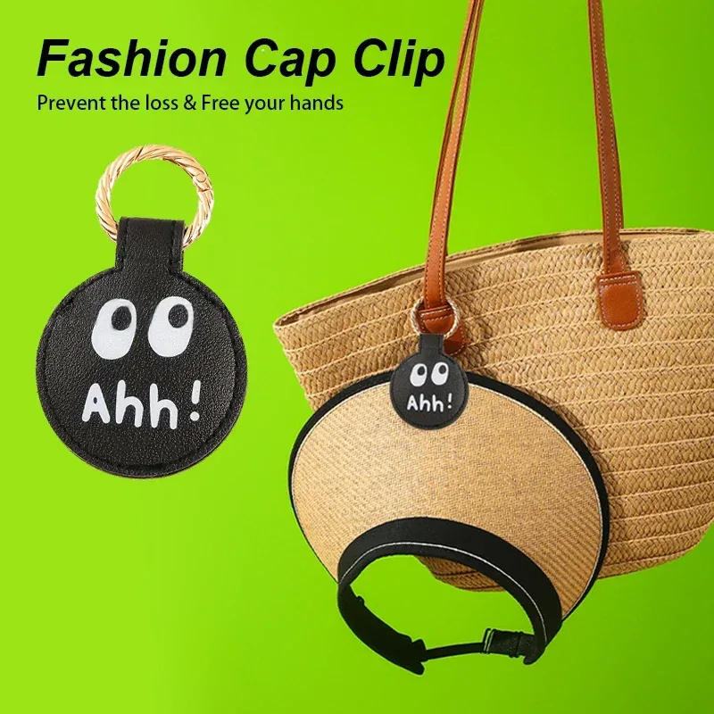 clip casquette cuir noir boucle dorée motif ahh oeil comique accessoire poignée sac osier voyage plage organisateurs légers