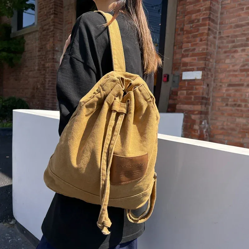 sac d'école solide décontracté, sac à dos en toile à la mode, sac à dos de grande capacité pour les déplacements, sac de voyage pour étudiants, nouvelle collection 2026