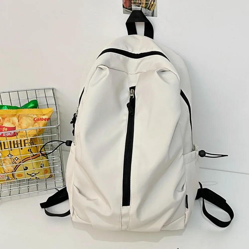 nouveau sac à dos simple de grande capacité, léger et étanche, sac à dos de randonnée avec fermeture éclair, couleur unie, sac d'université pour l'extérieur