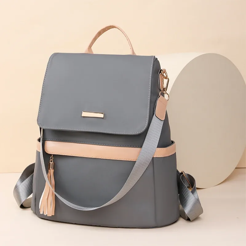 sac dos polyester beige noir gris bandoulière poignée souple fermeture éclair integree usage voyage femenin classique