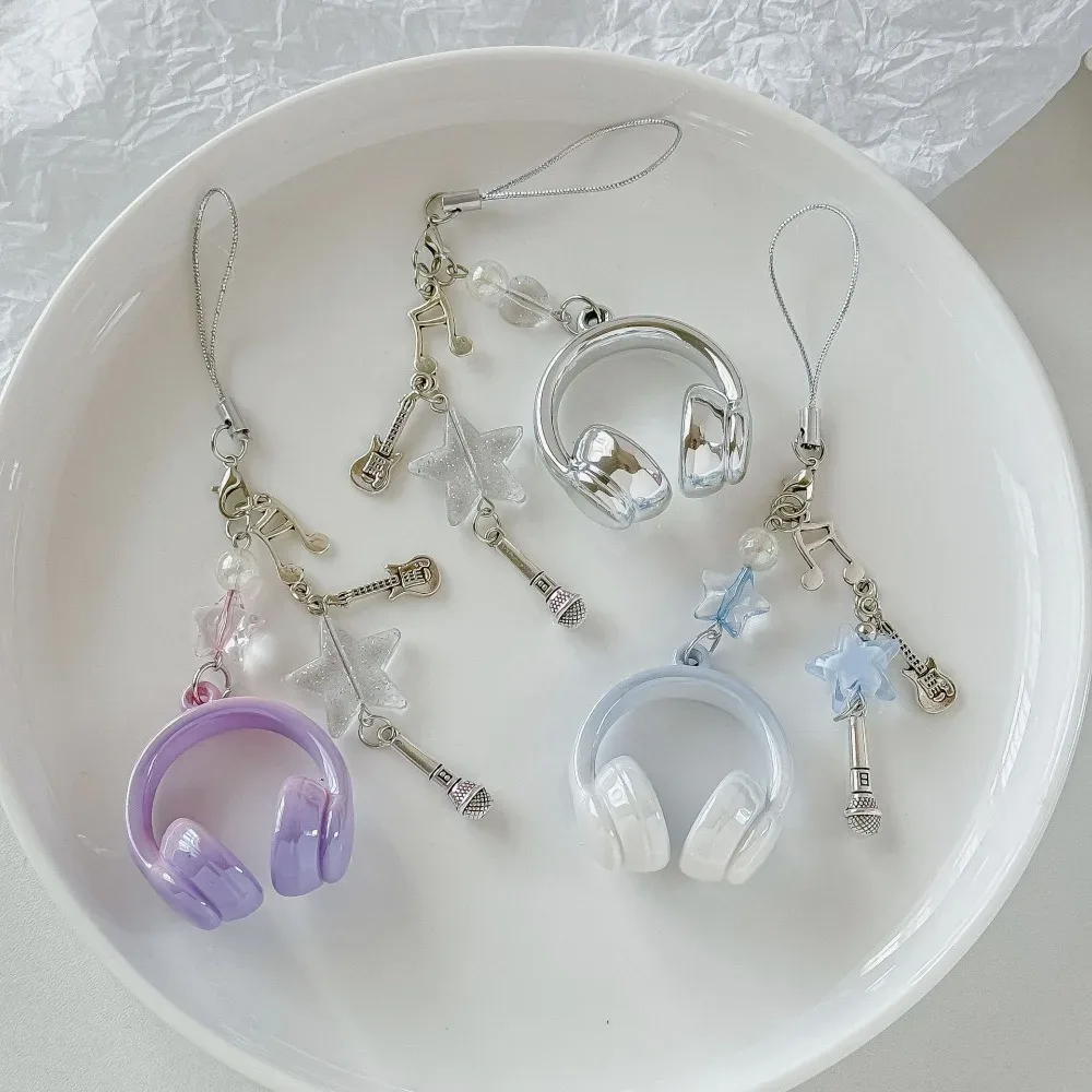porte clé musical chaine métal accoutrements musicaux petit pendentif créatif voyage sac main pods casque bouton poussoir écouteurs accessoire voyage