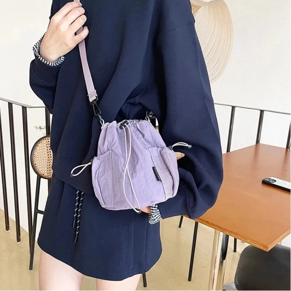 sac à bandoulière simple portable en nylon, petit sac léger de couleur unie pour l'extérieur