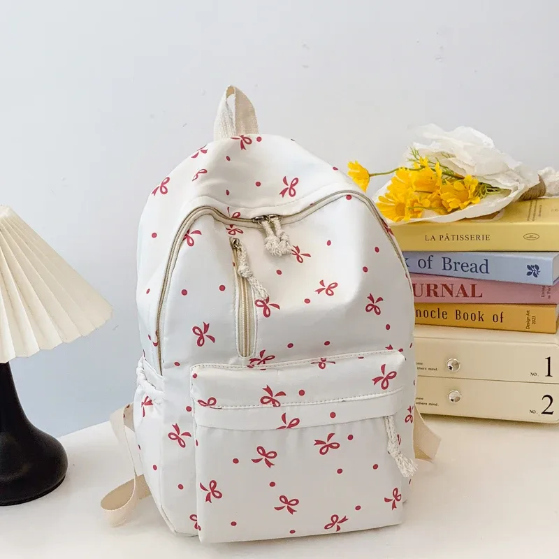 sac à dos matelassé à imprimé nœud ludique pour la rentrée scolaire, à usage quotidien, avec plusieurs poches, bretelles réglables, grande capacité