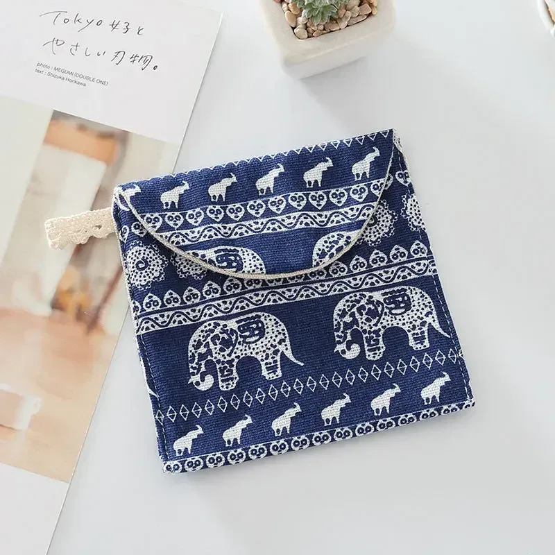 trousse toilette toile imprimés animaux couleur noir blanc bleu rose gris usage voyage cosmétiques maquillage