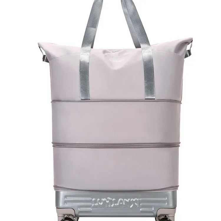nouveau sac de voyage léger avec roulettes universelles, grande capacité, pliable, imperméable, sac extensible pour les courts séjours et les voyages en plein air