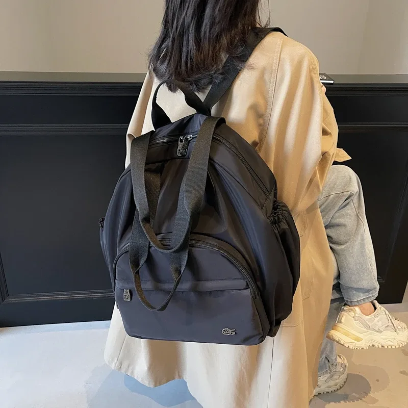 sac à dos de voyage en nylon pour femmes, sac à bandoulière multifonctionnel, style jeune et dynamique, sac d'école pour femmes