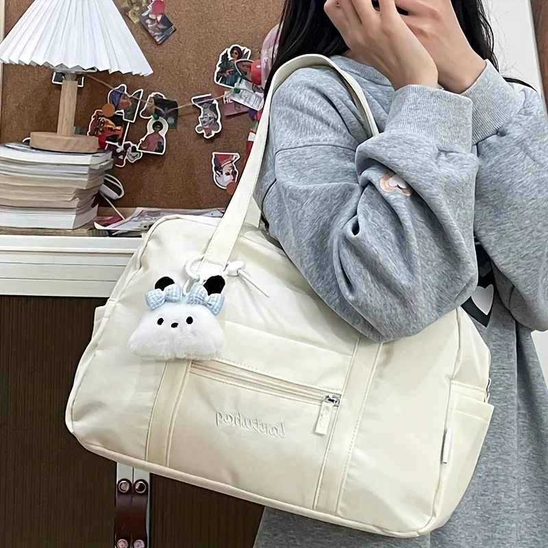 sac fourre-tout tendance avec joli breloque en peluche pour l'épaule, plusieurs poches latérales, poche avant zippée, sac à main grande capacité, idéal pour les voyages pour femmes