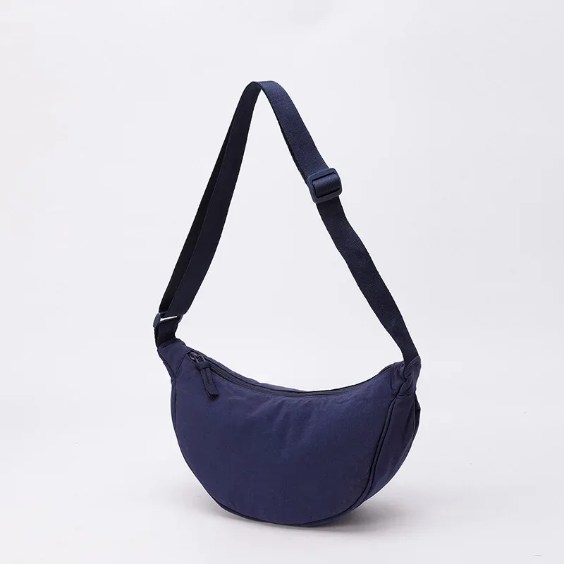 sac bandoulière polyvalent en nylon léger, durable et élégant, disponible en plus de 20 couleurs vibrantes pour un usage quotidien, les voyages et les sorties.