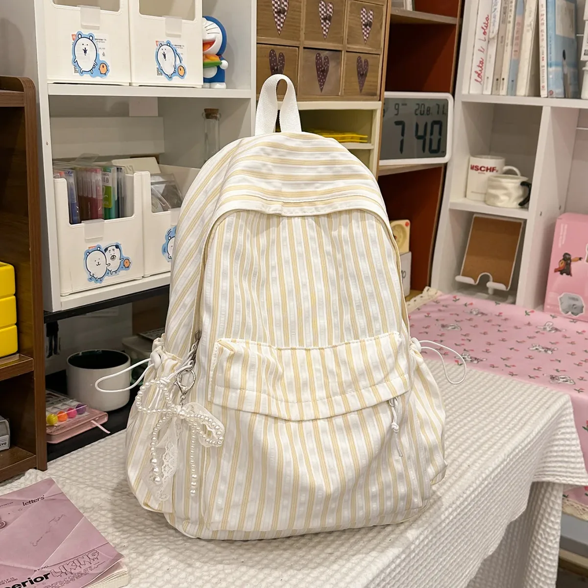 nouveau style japonais, sac à dos décontracté à rayures, grande capacité, pour collégiennes, idéal pour les voyages, sac à dos à double bandoulière pour filles 2026