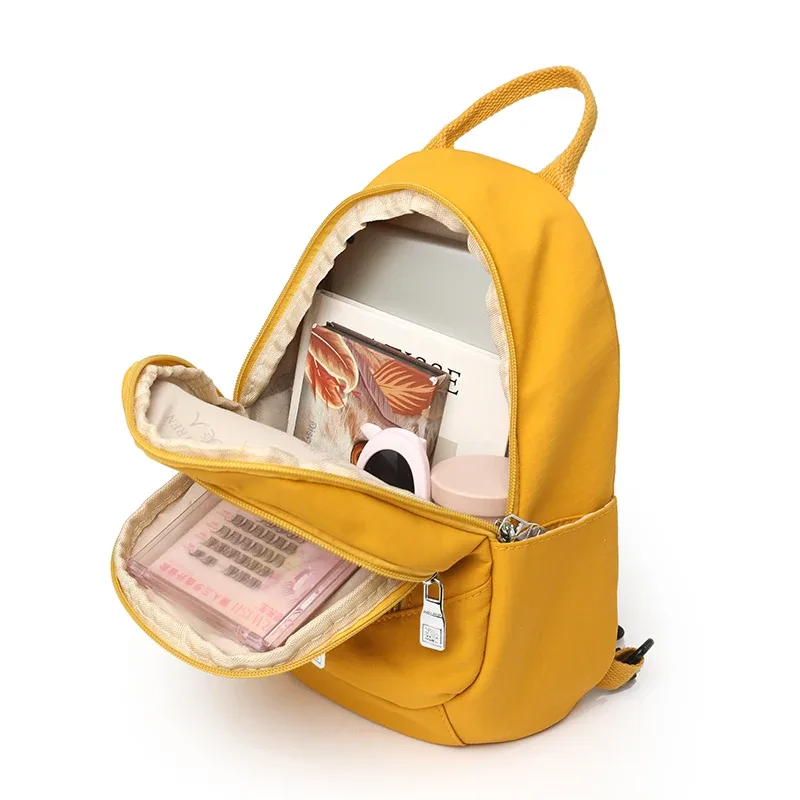 mini sac à dos en nylon six couleurs, petit sac à dos multi-compartiments pour les voyages quotidiens, sac à dos décontracté tendance pour femmes