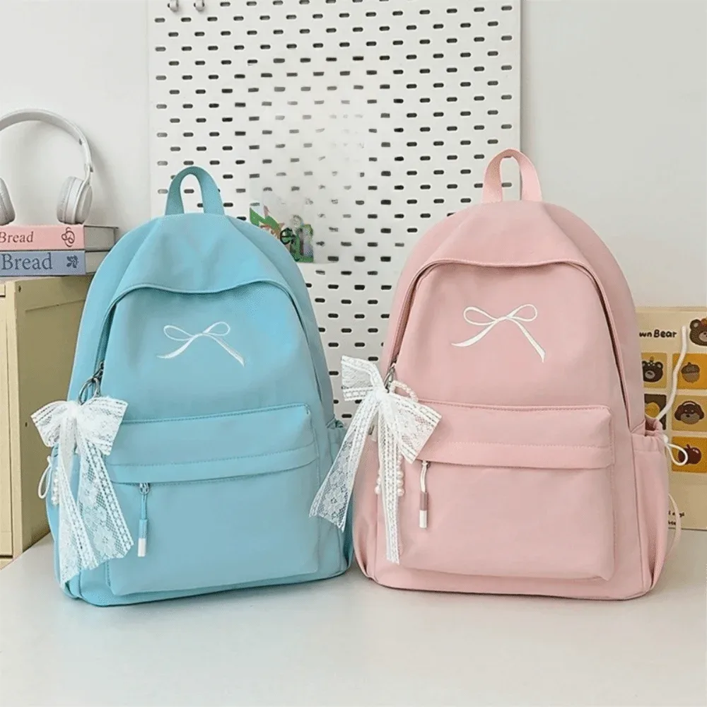 sac à dos portable avec nœud brodé pour filles, cartable en nylon de couleur unie pour étudiants, sac à dos de voyage léger de grande capacité