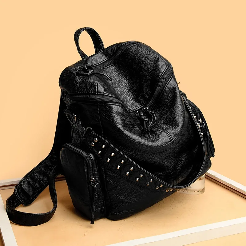 sac dos cuir souple polyester bleu noir gris marron poche ouverte fermeture éclair bandoulière arquée usage voyage femme décontracté