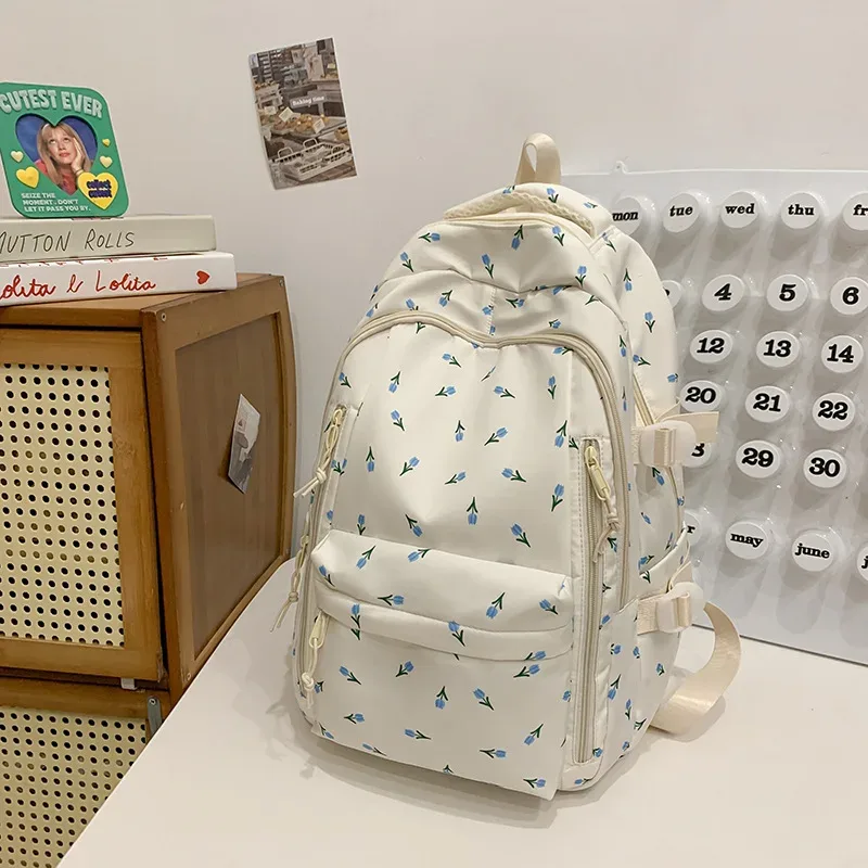 sac à dos décontracté à imprimé floral grande capacité pour filles, sac d'école en nylon imperméable, capacité pour ordinateur portable 14 pouces, style frais et doux