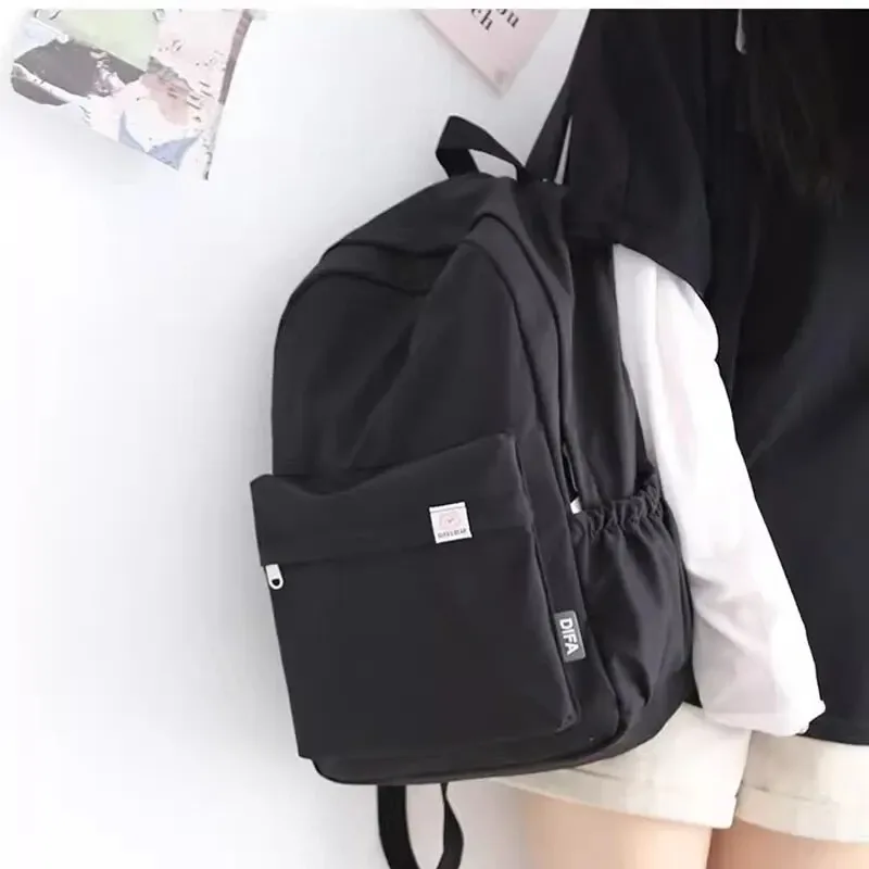 nouveau sac à dos imperméable en nylon pour femmes sac de voyage pour femmes sacs à dos cartable pour adolescentes couleur unie bookbag mochila bookbag