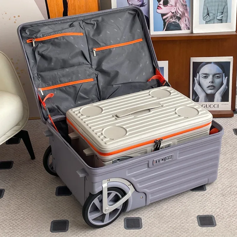 valise roulettes toupie abs gris clair orange poignées sécurité motif intérieur cercles noirs gris durabilité transport