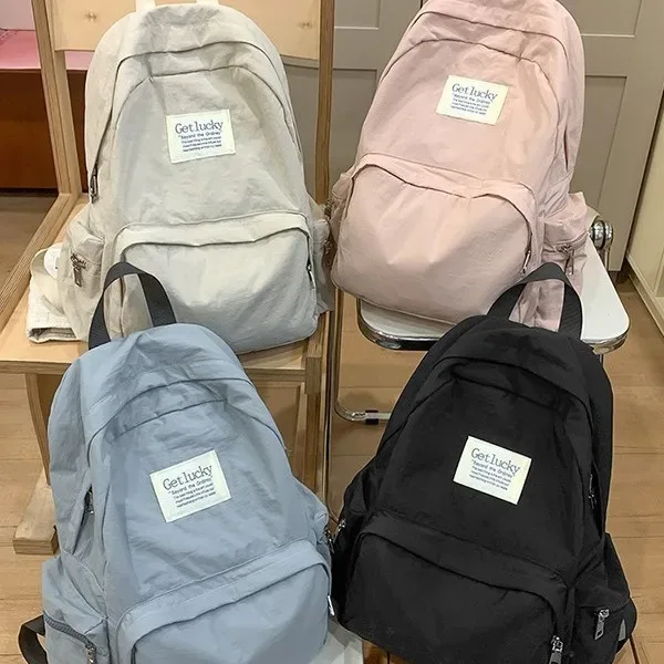 nouveau sac à dos de voyage décontracté pour femme 2025 – léger, grande capacité, imperméable en nylon, double bretelle, style frais et doux 14