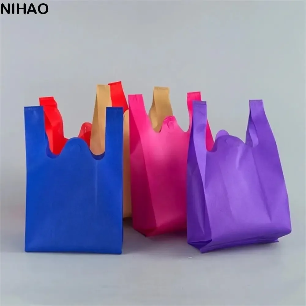 Sac de courses Non tissé de couleur unie, 50 pièces, sac à main Portable de grande capacité écologique, sac de rangement pratique et Durable pour jouets