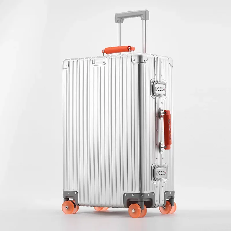 valise aluminium argenté roulettes oranges toupies ergonomiques poignées verticales voyage affaires élégante robuste durables