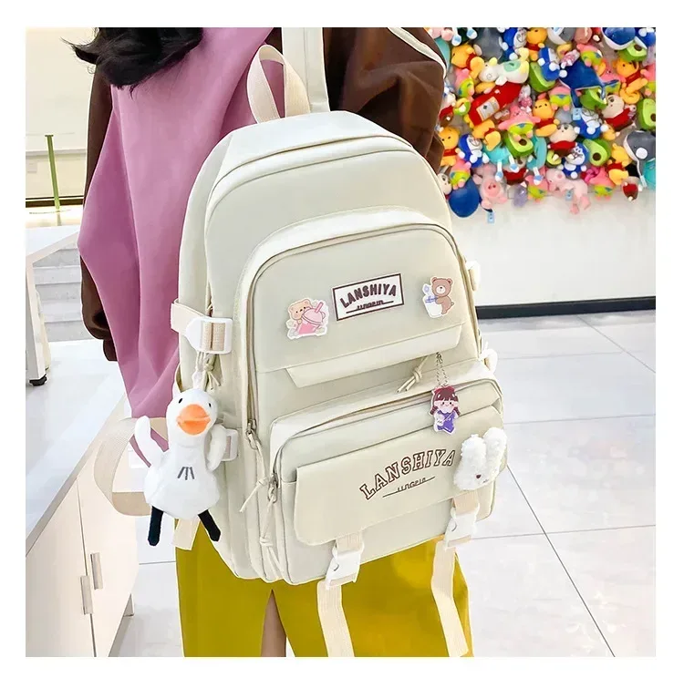 forêt japonais coréen harajuku étudiant sac à dos lycée femme grande capacité mode loisirs voyage nouveau style pendentif gratuit