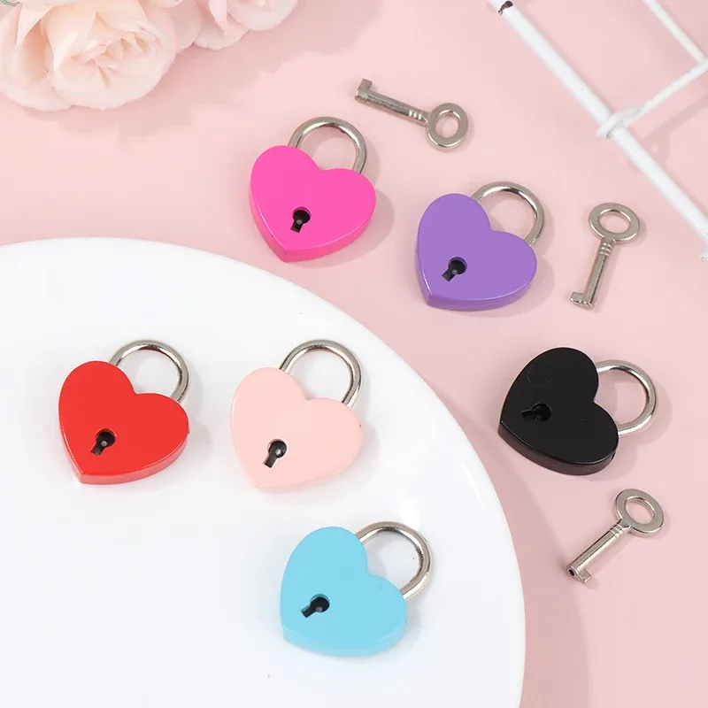 cadenas forme coeur serrure clé verrouiller nylon couleur rose violet bleu rouge or argent format petit usage voyage sécurité bagages identité
