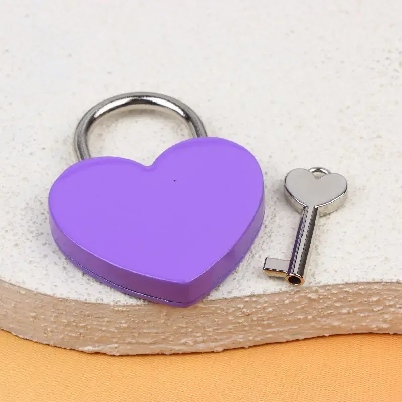 cadenas serrure tsa métal forme coeur couleurs vives marron dore rose rouge argent orange blanc usage voyage décoration objets personnels sécurité antivol