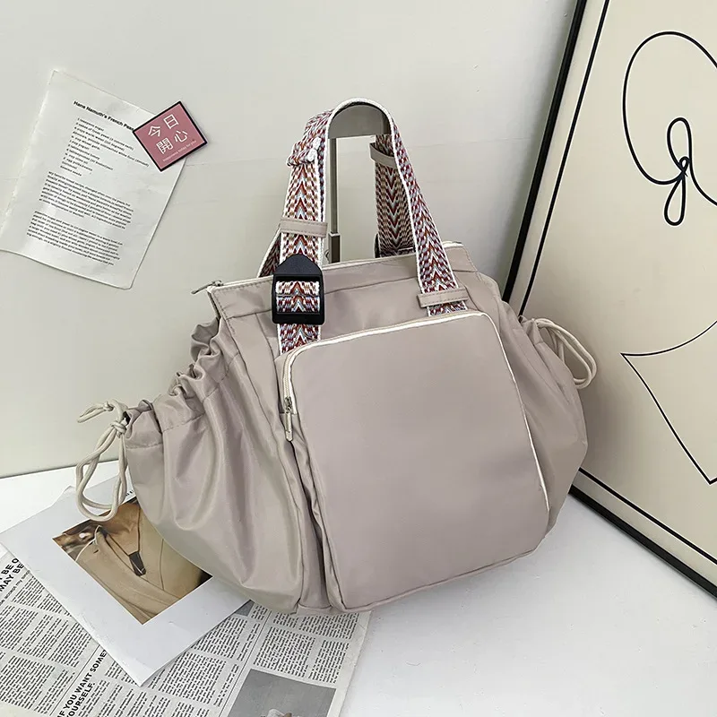 sac à bandoulière en nylon, sac de couleur unie, sac à la mode polyvalent et portable, sac de maman, sac de voyage de grande capacité