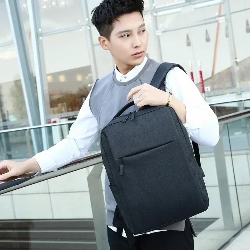sacs à dos d'affaires pour hommes et femmes, sac à dos de voyage portable de grande capacité, sac pour ordinateur portable ultraléger unisexe, cartable d'étudiant de couleur unie