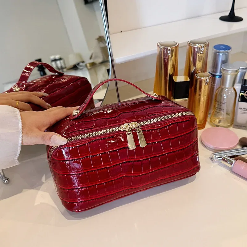 Sac de maquillage en cuir PU haut de gamme pour femmes, nouveau modèle de pierre, sac à main Portable léger de luxe, sac de rangement de maquillage de voyage de grande capacité