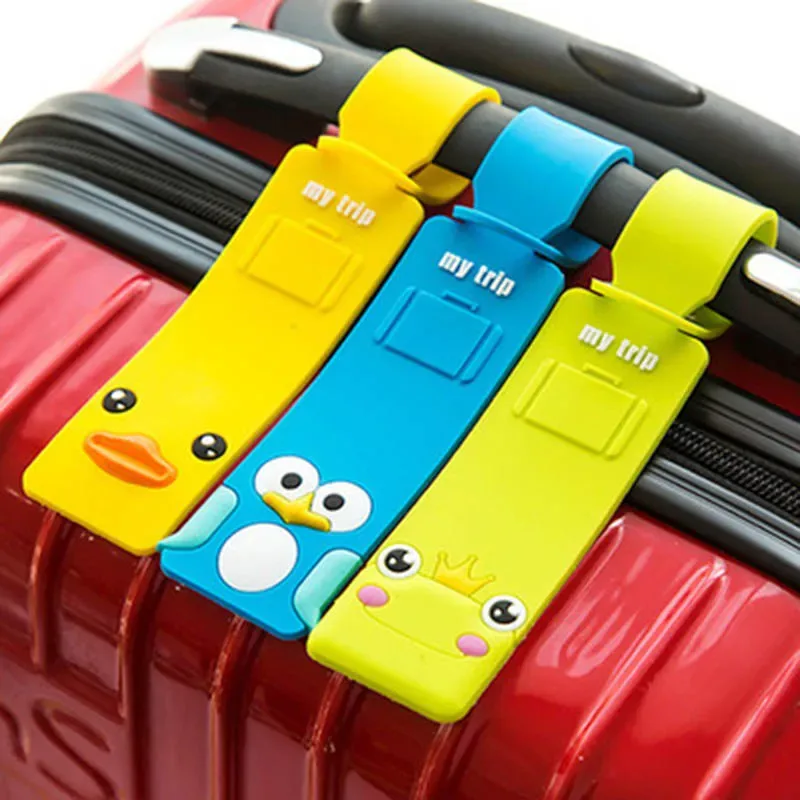 étiquette bagage plastique souple animaux colorés jaune bleu vert rouge turquoise fenêtre nom numéro téléphone adresse voyage enfant adulte